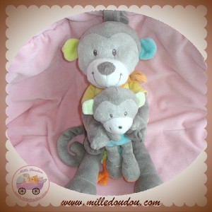 NICOTOY SOS DOUDOU SINGE MUSICAL GRIS JAUNE BEBE