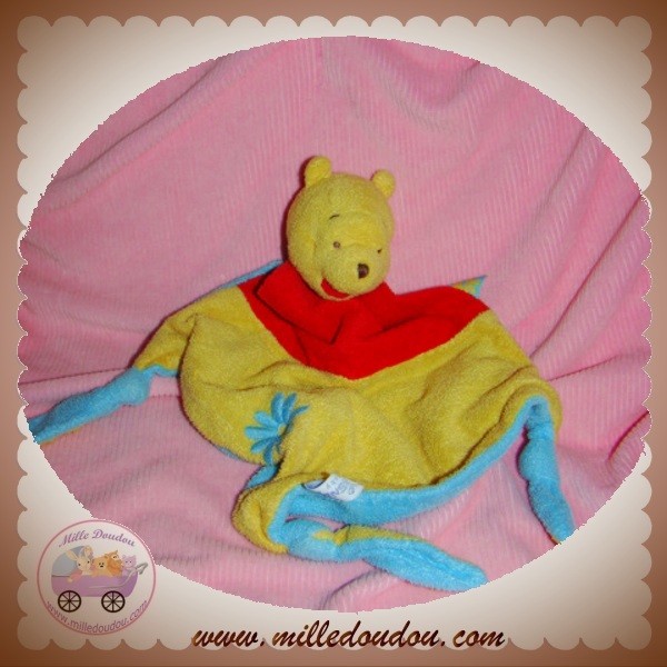 Doudou 'Winnie l'ourson' Disney Baby - jaune - Kiabi - 10.00€